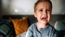 Photo of an upset screaming child to illustrate the article Are Humans Inherently Good or Evil?