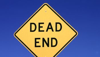 Dead end sign illustrating the need for the end to cruelty.