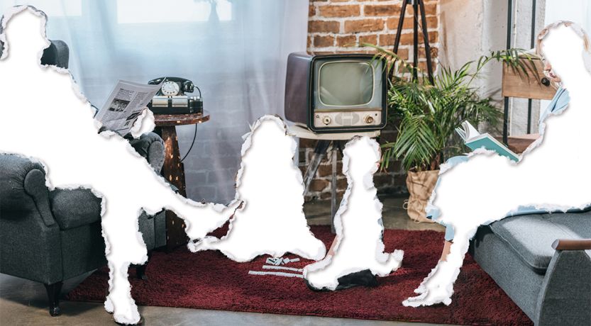 Photo of a 1950s or 60s era family with the parents and two children torn out to illustrate the article The Disappearing Family