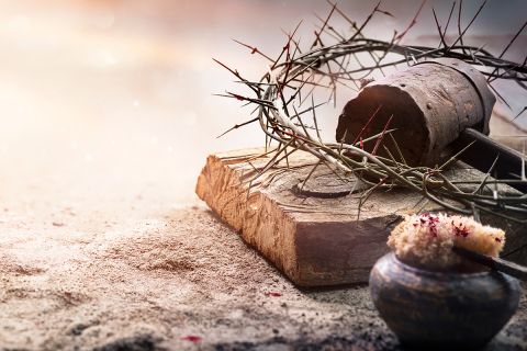 Graphic of a crown of thorns and hammer to illustrate the article highlighting the love of Jesus Christ, titled 