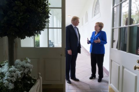 Photo of U.S. President Donald Trump with German Chancellor Angela Merkel to illustrate the 2018 article Transatlantic Turmoil Escalates