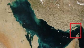 Satellite photo of the Persian Gulf with the Strait of Hormuz marked.