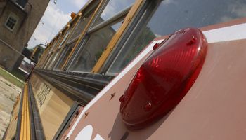 School bus, illustrating bullied bus monitor video.