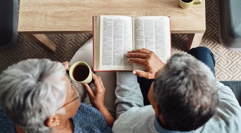 Seek the Comfort of the Scriptures: photo of two people studying the Bible