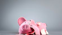Photo of a broken piggy bank to illustrate the article, Should We Worry About Growing World Debt?