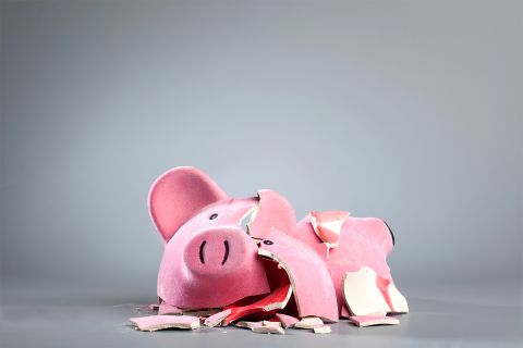 Photo of a broken piggy bank to illustrate the article, Should We Worry About Growing World Debt?