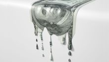 Graphic of a dollar bill melting and dripping to illustrate the article Trade Wars, the U.S. National Debt and the Dollar Crisis