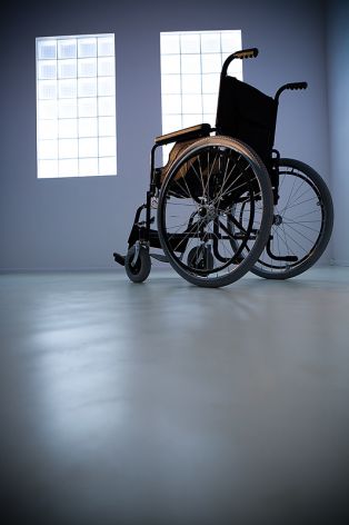 Empty wheelchair representing 