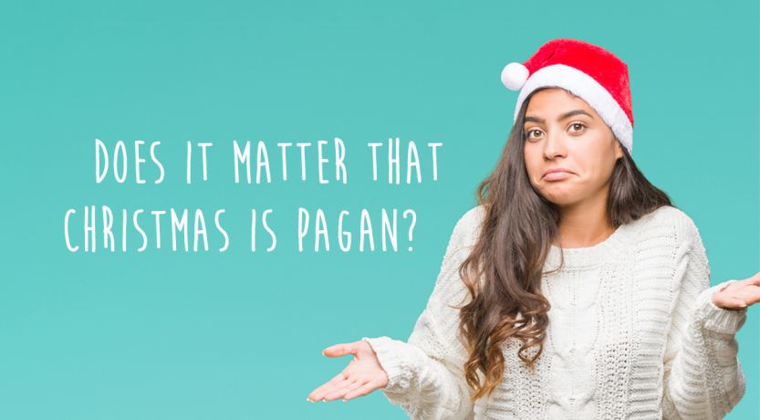 Photo of a girl with a Christmas hat and a questioning expression to illustrate Does It Matter That Christmas Is Pagan?