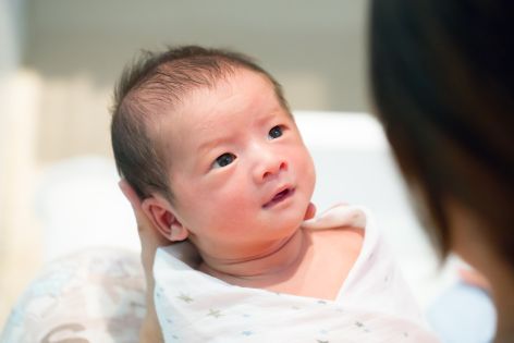 Baby Gazing at Mother