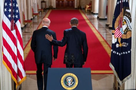 <p><strong>Negotiating peace?</strong><br />
U.S. President Barack Obama walks down the Cross Hall of the White House with Vice President Joe Biden after delivering a statement on the controversial Iran nuclear agreement on July 14, 2015.</p>