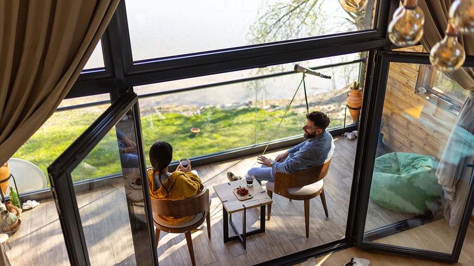 Photo of people on a patio enjoying life