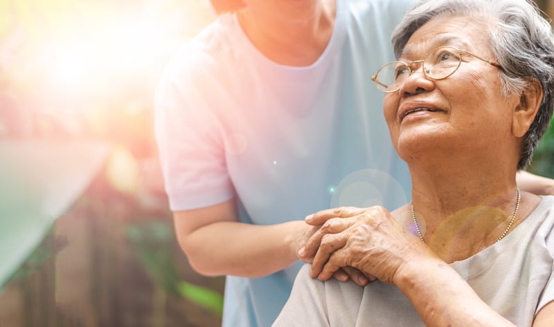 Elderly women being consoled 