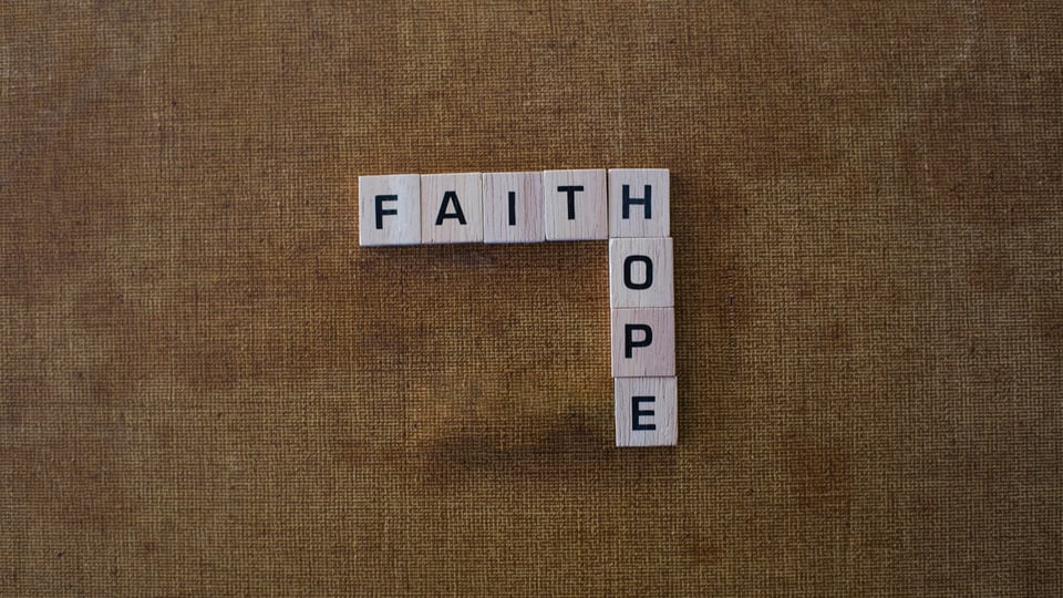 Photo of letter tiles spelling Faith and Hope to illustrate the article 