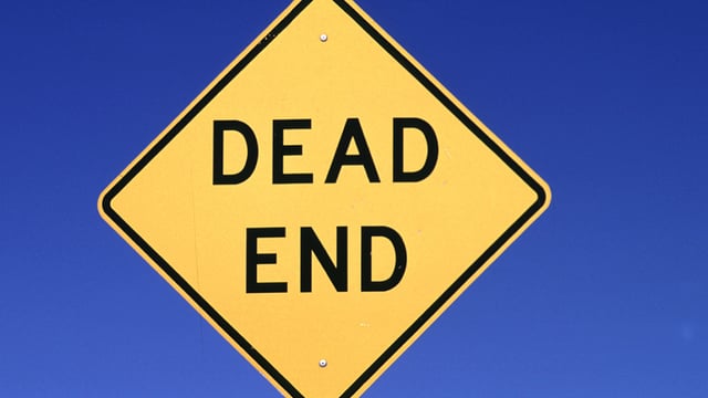 Dead end sign illustrating the need for the end to cruelty.