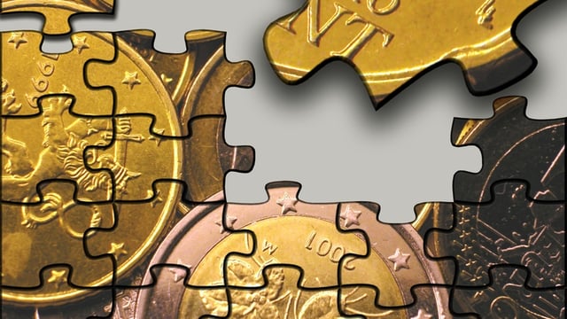 The future of Europe illustrated with a jigsaw puzzle of euro coins.