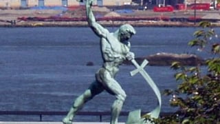 The Kingdom of God Is Real! Let Us Beat Swords into Plowshares, a sculpture by Evgeniy Vuchetich at the United Nations (Wikimedia Commons).