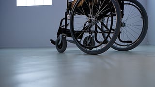 Empty wheelchair representing 